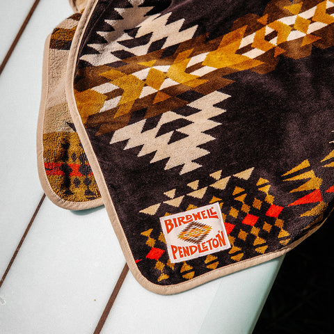 Pendleton x Birdwell Terry Poncho. Detail Shot of Material showing the diamond patterns and label.