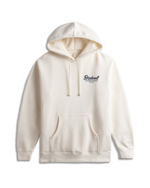 Front view of the hoodie inbone with screenprinted Birdwell in script font and california originals since 1961 beneath screenprinted in Navy over left of chest. Background is white.