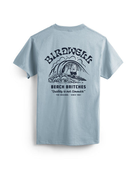 Back of Light Blue T-Shirt with Surfin' Birdie Graphic on left Side Featuring Birdie Surfing on a Wave. Text on shirt says Birdwell Beach Britches 