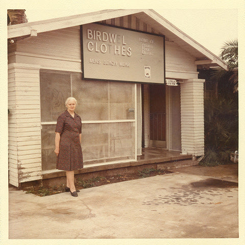 Vintage image of carrie birdwell in front of original birdwell storefront.