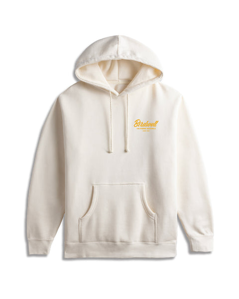 Flatlay of Bone Hoodie with Yellow Graphic of 