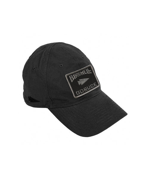 Front view of black GORUCK Tac Hat, embroidered with GORUCK logo on right side and Birdwell x GORUCK patch on front panel of hat.