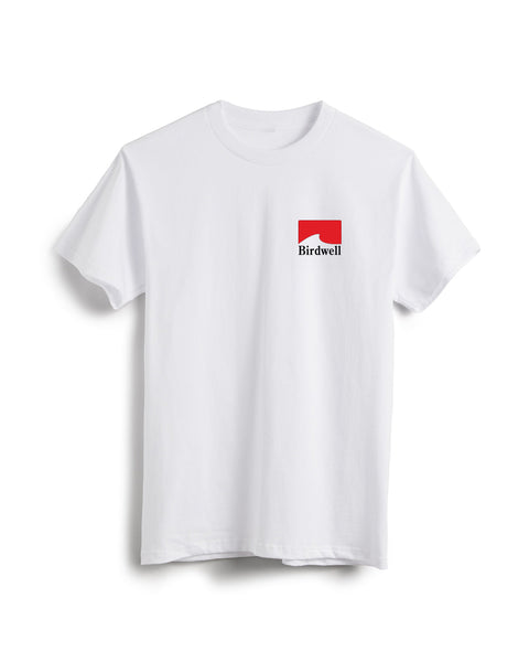 Front View of white T-Shirt with Grit Graphic of red wave with black Birdwell text. Background White.