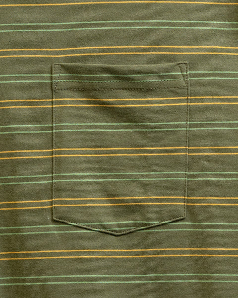 Close up pocket detail showing the pocket and double horizontal yellow and light green stripes.