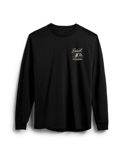 Front view of black long sleeve shirt with Drop In Screen Printed Graphic in Milk. Screen Printed Graphic features Birdie running into a wave to the right while holding surfboard overhead. Birdwell logo in script above with California Originals since 1961 below. T-shirt on white background.