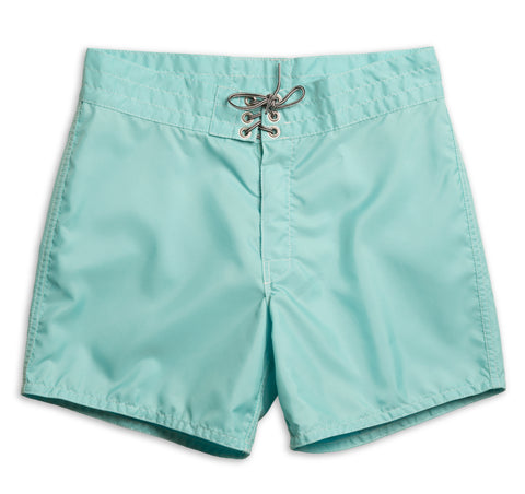 310 Boardshort in Aqua color with drawstrings tied and button closures buttoned. Short length boardshort with an inseam ranging from 14 to 18 inches. On a white background. 